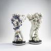 Two flower putti, c. 1910