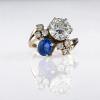 Elegant cocktail ring with impressive diamond and sapphire
