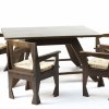 Dining table and four armchairs, c1914. 