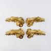 Two pairs of curtain retainers, c1899 