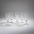 Six 'High Society' champagne flutes, c. 1980