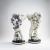 Two flower putti, c. 1910