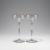 Two champagne glasses, c1899
