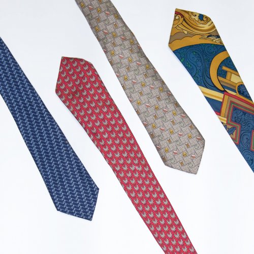 Four ties with different motifs