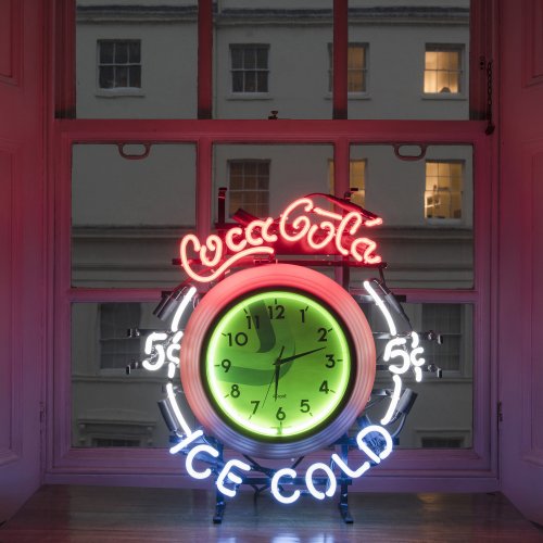 Advertising clock with neon writing, around 1990
