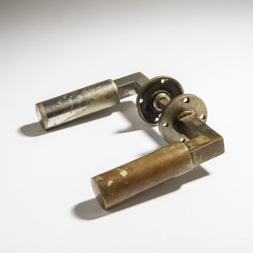 Pair of lever handles for external doors with bezels, 1923