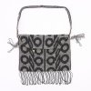 Cut steel flap bag with geometric pattern, c. 1920