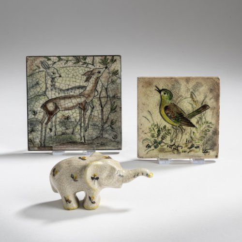 Two decorative tiles and an elephant, c. 1930