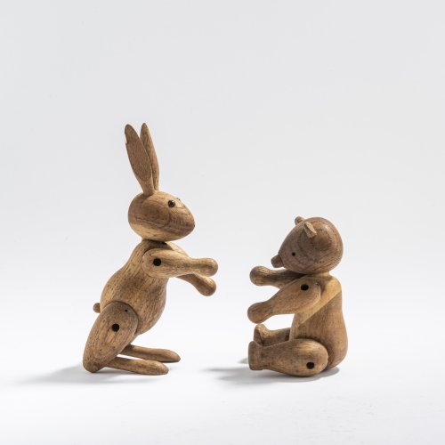 Two wooden figures: Bear, 1952, and Rabbit, 1957