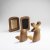 Two anthroposophical bookends, two picture frames, a candlestick, 1930-1950