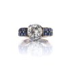 Alliance ring with a brilliant cut diamond and sapphires