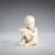 Ivory figure 'Boy with cornucopia', before 1914