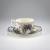 Coffee cup and saucer with spider, 1910