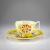 Coffee cup and saucer with parakeet 1905