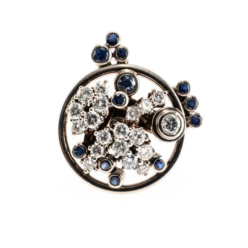 Floral cocktail ring with diamonds and sapphires