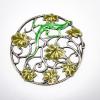 Brooch with leaf tendrils and lizard, c. 1910