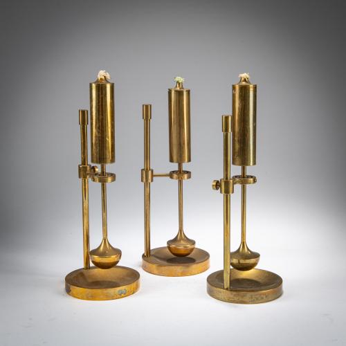 Three kerosene candlesticks, c. 1950