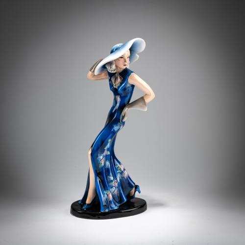 'Standing elegant lady with large hat and long gloves', c. 1935