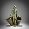 Female figure with two baskets, c. 1903