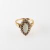 Art Deco navette ring with opal and diamonds