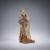 Damenfigur im Wintermantel, um 1900