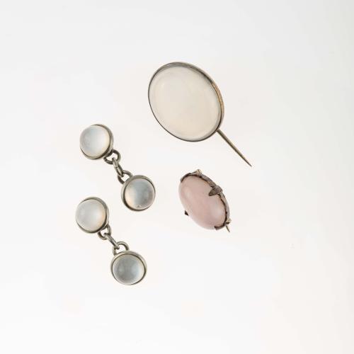 Pin, brooch, pair of cufflinks with moonstones, c. 1900