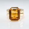 Cocktail ring with gold-colored citrine