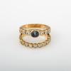 Two stackable rings with sapphire and diamonds