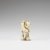 Netsuke. Man, lacing his shoe