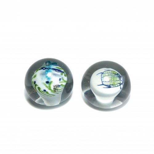 Two paperweights, c1974