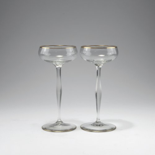 Two champagne glasses, c1899