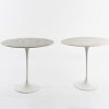 Two oval occasional tables '161 M', 1957